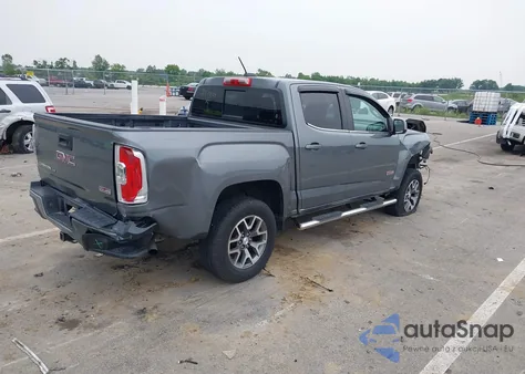 2019 GMC Canyon All Terrain W/Cloth z USA, uszkodzony, nr VIN 1GTG6FEN4K1347025